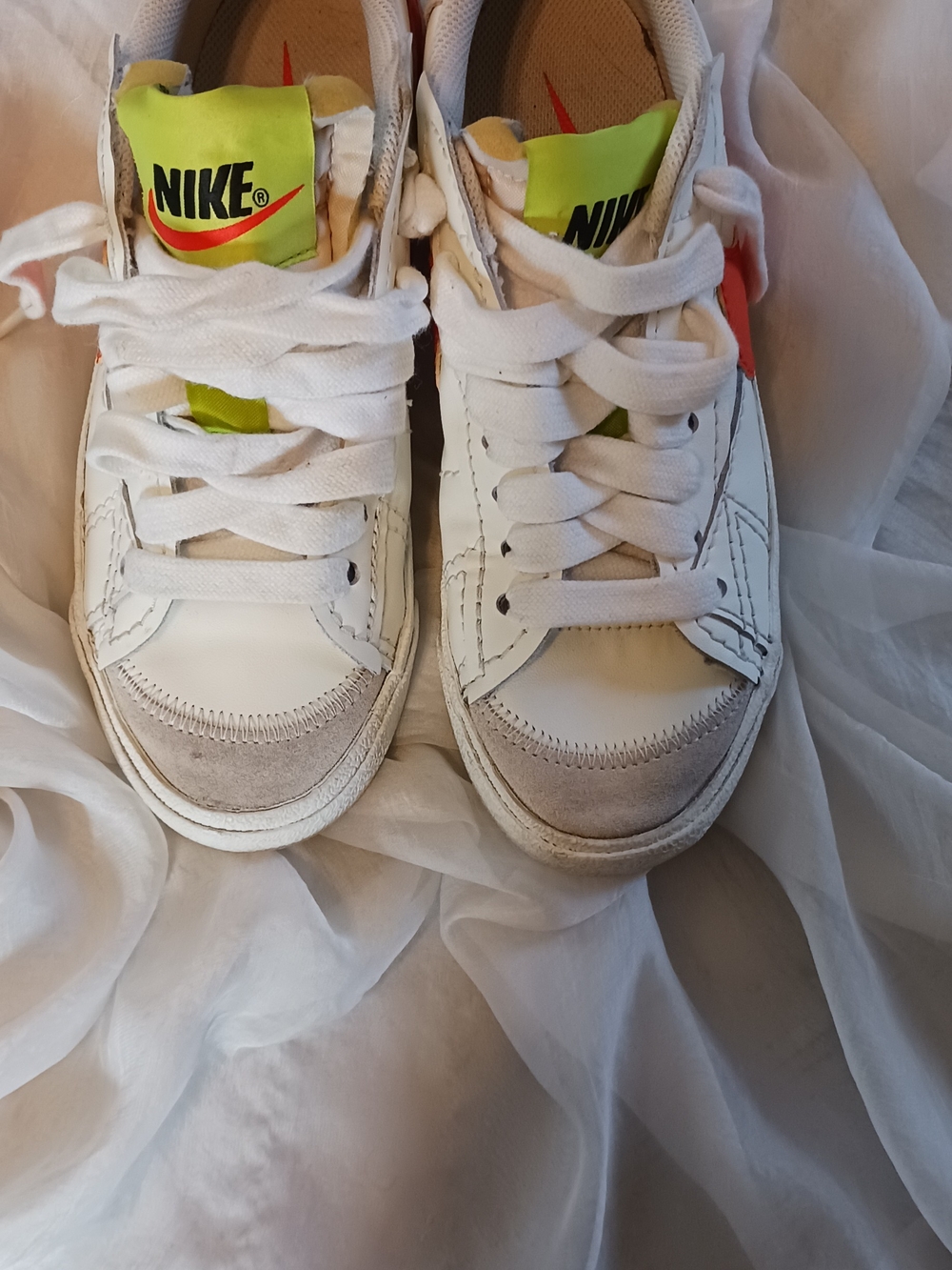 Nike Kids White Sneakers with Neon Green and Orange Accents